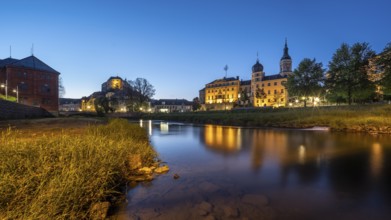 Town view with Upper Castle, Lower Castle and St Mary's Church on the River White Elster at dusk,