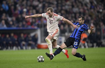 Tackle, action Henrikh Mkhitaryan Inter Milan (22) on Harry Kane FC Bayern Munich FCB (09)