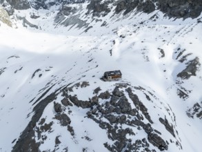 Aerial view, winter in the mountains, Chamanna Jenatsch CAS, Swiss Alpine Club hut, Val Beve,