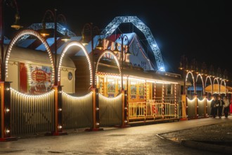 Illuminated circus with colourful arches and lights at night, Böblingen, Germany, Europe