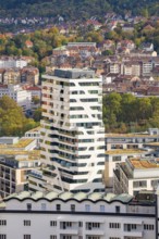 White, curved building with many windows in an urban environment, Stuttgart, Germany, Europe