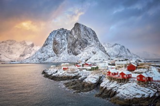 Famous tourist attraction Hamnoy fishing village on Lofoten Islands, Norway with red rorbu houses.
