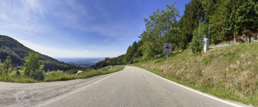 Country road through the Black Forest with view towards the Upper Rhine Graben near Sasbachwalden,