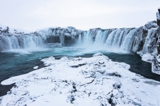 Godafoss waterfall, snowy landscape, drone shot, Northern Iceland Eyestra, Iceland, Europe
