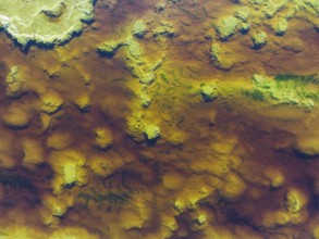 Detail of the Rio Tinto (Red river) with its reddish hue due to oxidised iron minerals and other