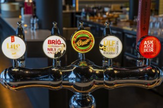 Illuminated beer tap at Hnoss Restaurant and Bar, Harpa Concert Hall and Congress Centre,
