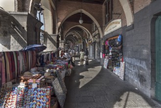 Stalls in the historic arcades of the Old Harbour, Genoa, Italy, Europe