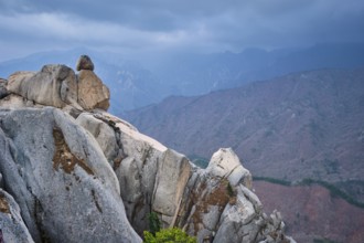 View of stone and rock formations from Ulsanbawi rock peak in stormy weather. Seoraksan National