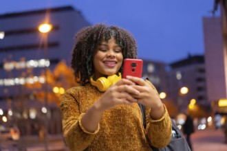 Portrait of black ethnic girl in the early morning going to the university on the way back to
