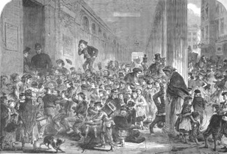 Crowd of children for the Christmas performance of the pantomime at the Drury-Lane Theatre, London,
