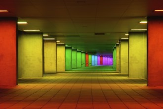 Colorful mulitcolord illuminated gallery tunnel rainbow passage under NAI building, Nederlands