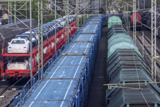 Sindelfingen railway station. Goods trains parked on the tracks. Automotive RailNet. Car transport