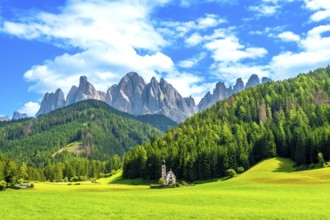 Scenic summer view of the idyllic alpine valley of val di funes with st. Magdalena church and the