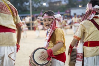 Participants Play dhol (Drum) on the final day of a Bihu dance workshop ahead of Rongali Bihu