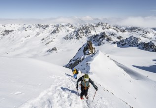 For mountaineers with ice axe and crampons, ascent through steep snowfield to Piz Kesch or Piz