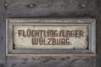 Sign at the entrance gate of Wülzburg Castle, reminder of the refugee camp from 1952 to 1968,