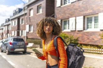 Latin young beauty woman using phone to get directions walking along residential street