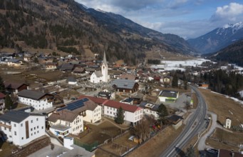 Drone shot, view of village with parish church, Rangersdorf, Mölltal, Carinthia, Austria, Europe
