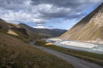 Road through a mountain valley, Tian Shan, Sky Mountains, Sary Jaz Valley, Kyrgyzstan, Asia