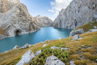 Turquoise mountain lake Kol Suu with rocky steep mountains, Kol Suu Lake, Sary Beles Mountains,