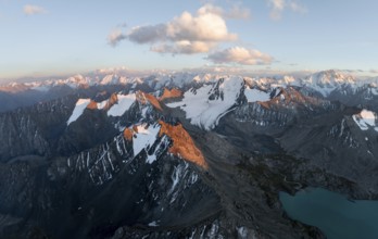 Evening mood, mountain panorama, aerial view, 4000 metre peak with glacier, mountain pass and