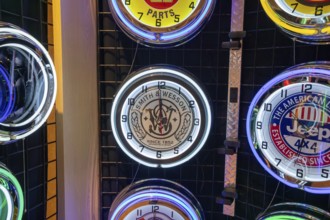 Livonia, Michigan - Clocks with corporate logos are on sale at the Clocks, Rocks & More store at