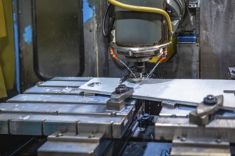 Close-up of CNC Milling Machine in a factory working with no people