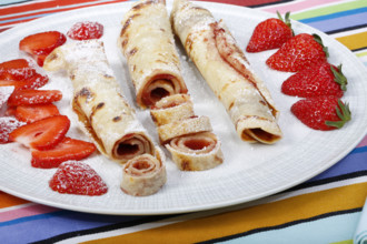 Swabian cuisine, filled pancakes, Flädle with strawberry jam and icing sugar, Gsälz, fresh