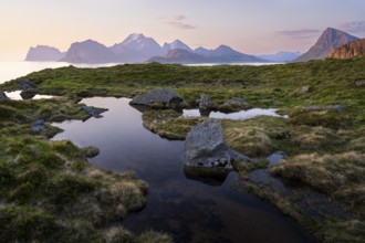 Landscape at Stornappstinden mountain. Foothills of a stream in the foreground. View of the