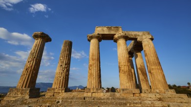 Archaic Temple of Apollo, Doric columns, Ancient Greek ruins with columns and blue sky,