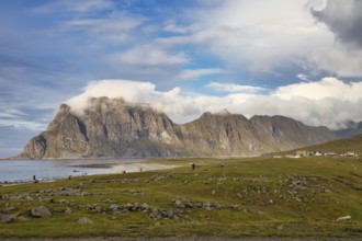 Tourists at Uttakleiv beach, Leknes, Nordland, Lofoten, Norway, Europe