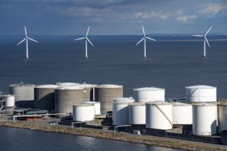Wind turbines, offshore wind farm east of Copenhagen, in Øresund, tank farm in Prøvestenen harbour,