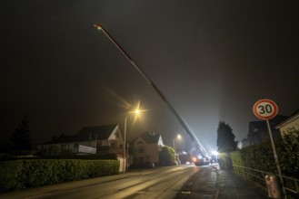 Transport of a 68 metre long, 22 tonne blade of a wind turbine, here in Breckerfeld, with a