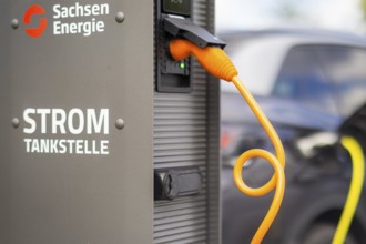 Electric cars at charging stations, Dresden, Saxony, Germany, Europe