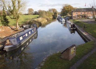 Narrowboats on the Kennet and Avon canal, the Waterfront pub, Pewsey wharf, Wiltshire, England, UK