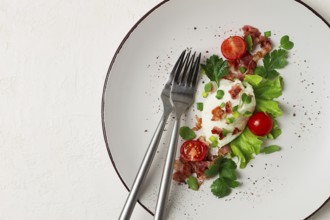 Poached egg, with bacon and vegetables, breakfast, homemade
