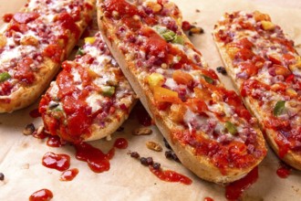 Pizza on a baguette, top view, close-up, no people, fast food, street food