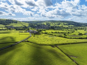 Farms and Fields over Cononley and River Aire from a drone, Keighley, North Yorkshire, England,