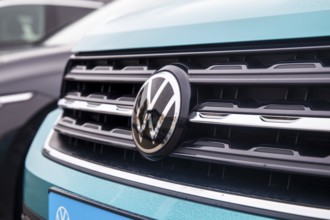Close-up of vehicles from the car manufacturer VW in a car dealership