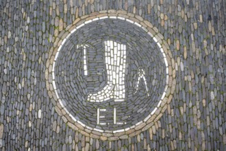 Guild coat of arms of a shoemaker as a floor mosaic in the historic centre of Freiburg, Freiburg im