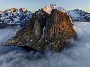 Aerial view, steep mountains, coast, winter, fog, morning light, Reine, Moskenesoya, Lofoten,