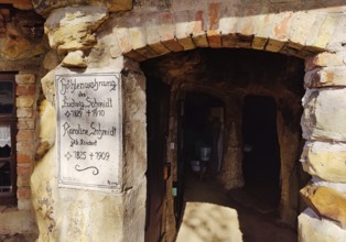 Sign at the entrance to the Schmidthöhle cave, Langenstein cave dwellings, district of Halberstadt,