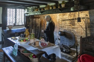Interior view, kitchen, fireplace, table, food, museum guide, Anne Hathaway's Cottage, Shottery,