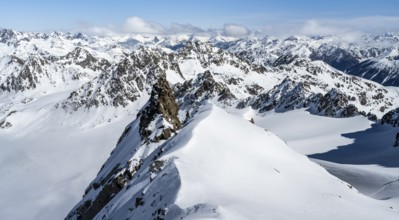 View of mountain panorama in winter on Piz Kesch with glacier Vadret da Porchabella, high tour, ski