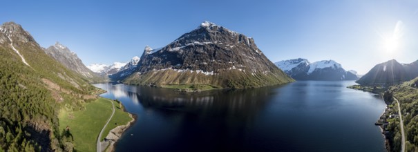 Panorama aerial view of fjord Hjørundfjord, from village Øye (left) to Urke (right), Mt.