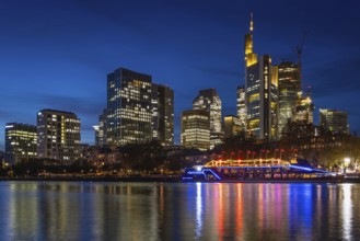 The Kansas City Chiefs' NFL boat is anchored on the River Main in front of Frankfurt's banking