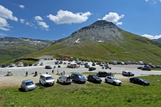 Car park with cars at the top of the Furka Pass, Goms, Valais, Switzerland, Europe