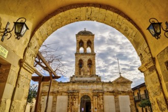 HDR, entrance arch, lanterns, main church, cloudy sky, Panagias, Odigitrias, Gonias, Orthodox