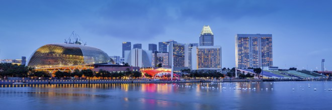 Panorama of Singapore skyline at Marina Bay in the evening