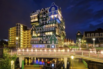 ZAANDAM, NETHERLANDS, MAY 21, 2018: Inntel Hotel in Zaandam illuminated at night. Design of